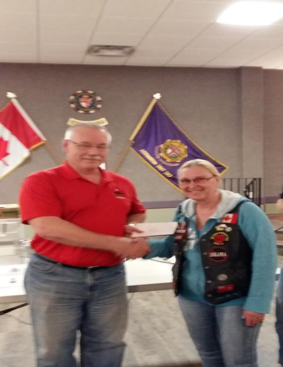 tris service pic donating to Veterans Canada